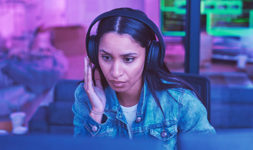 Developer, computer or headphones in neon coding for cybersecurity iot, night SEO thinking or code .