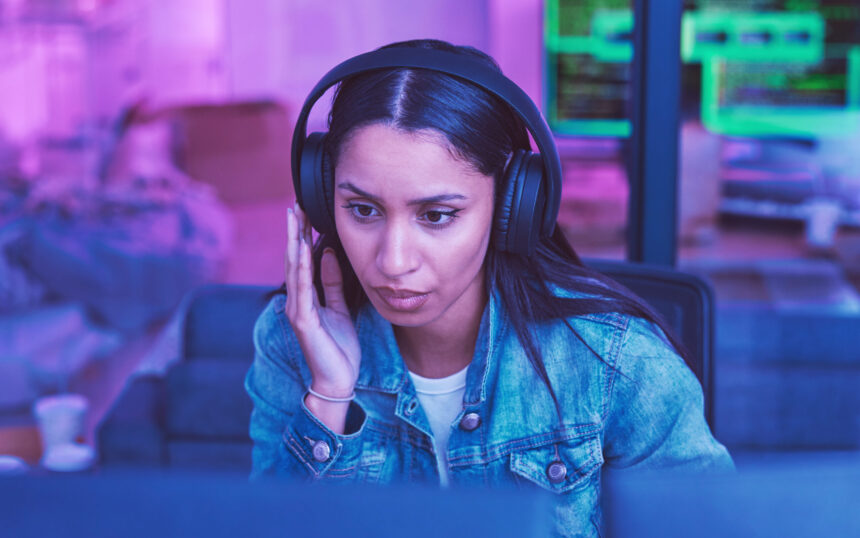 developer-computer-or-headphones-in-neon-coding-f-2023-11-27-05-18-11-utc Developer, computer or headphones in neon coding for cybersecurity iot, night SEO thinking or code .